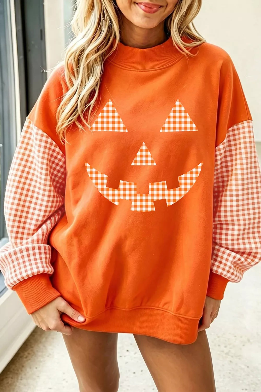 Plaid Sleeve Halloween Pumpkin Face Graphic Sweatshirt