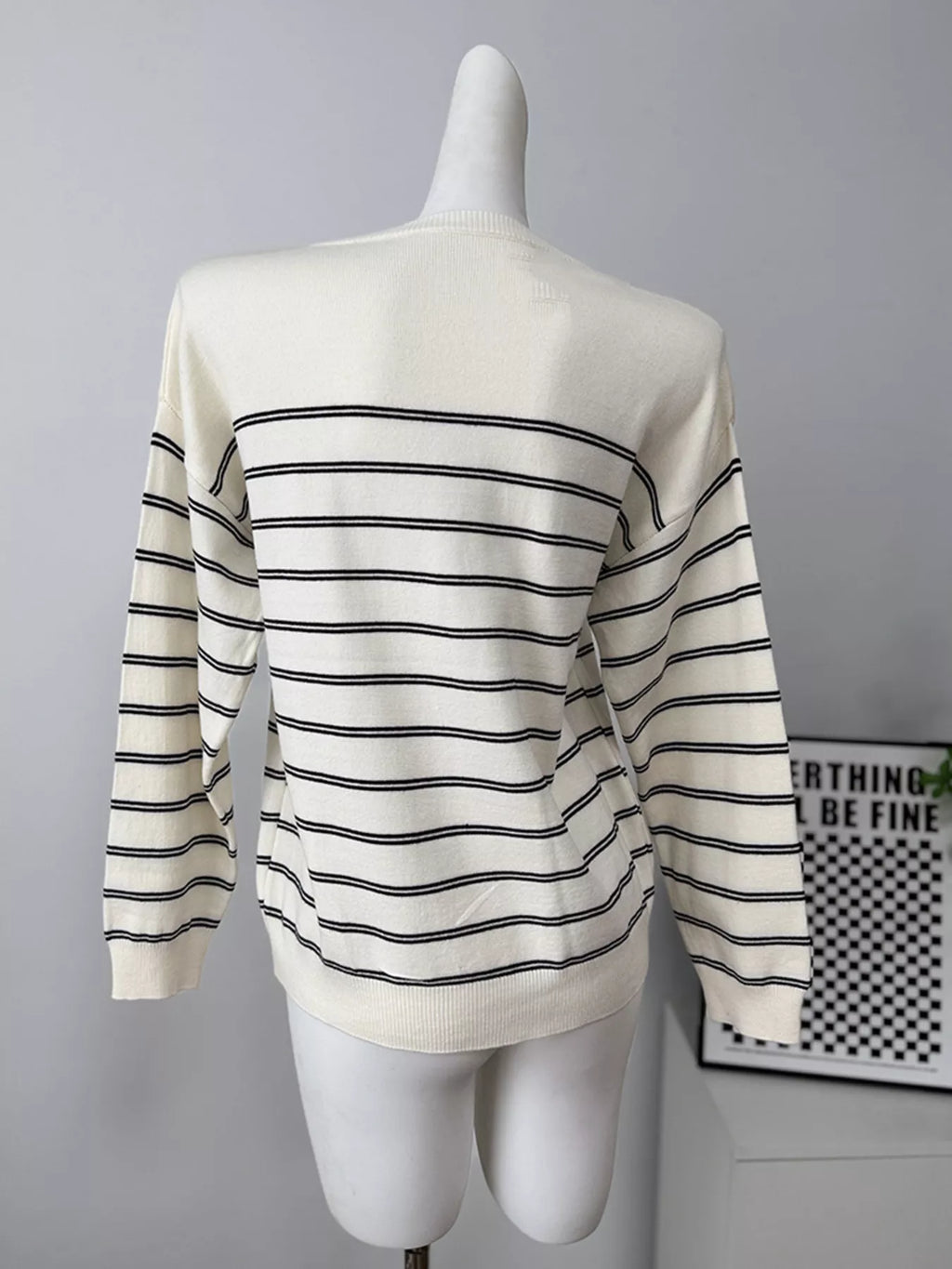 Classic Striped Crewneck Knit Top with Layered Sweater Detail
