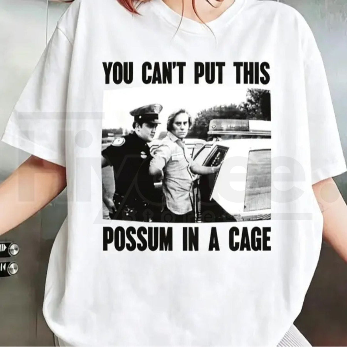 You Can’t Put This Possum In A Cage T-Shirt – Funny George Jones Arrest Graphic Tee