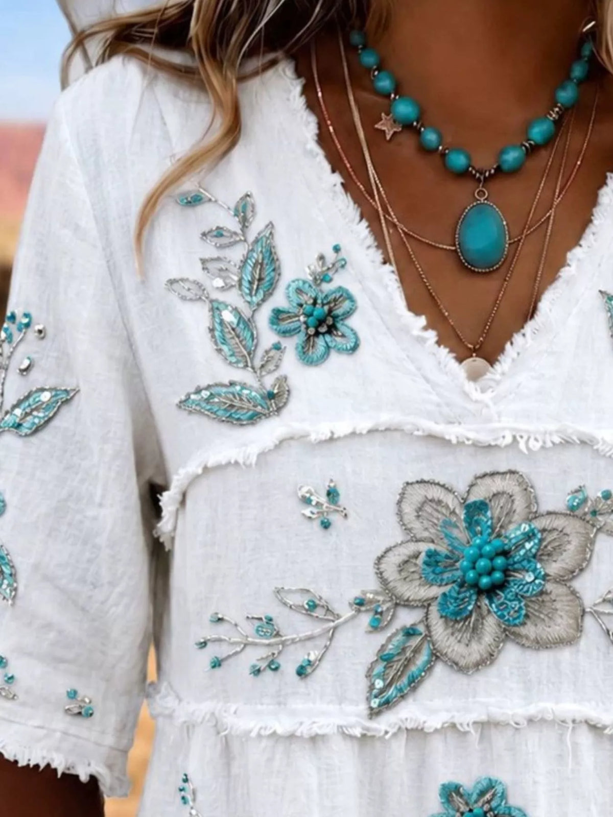 Full Size Floral Raw Hem V-Neck Blouse Plus Size