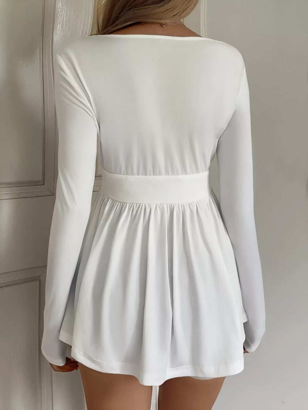 Surplice Peplum Long Sleeve Top